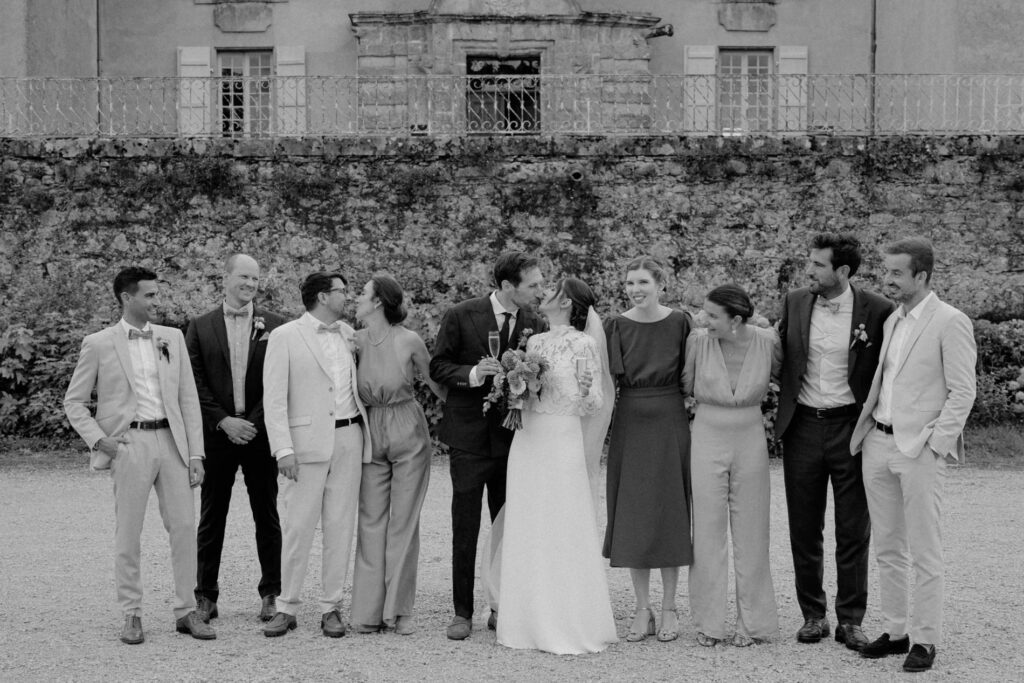 Group pictures taken in the shade as part of a wedding day timeline in the South of France