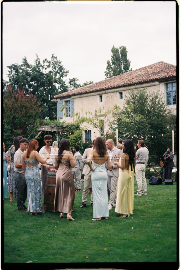 Cocktail hour in the shade as part of a wedding day timeline in southern France