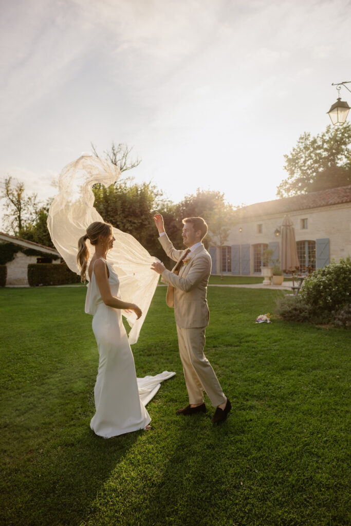 Couple stepping away during their wedding day timeline in the South of France for sunset portraits
