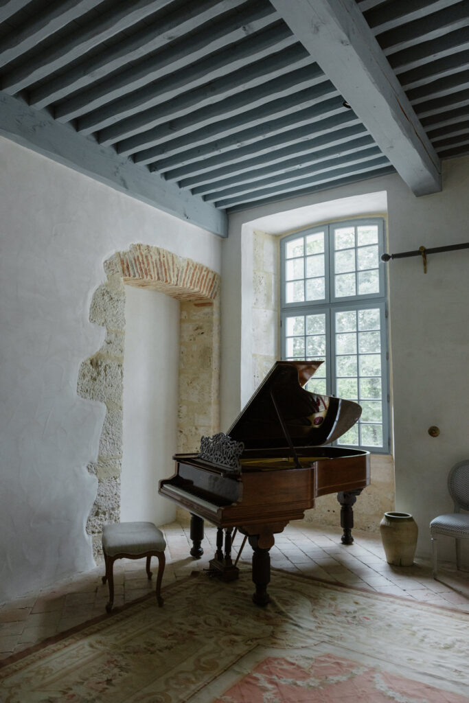 Piano room at Domaine du Rodier, intimate venue in South of France.