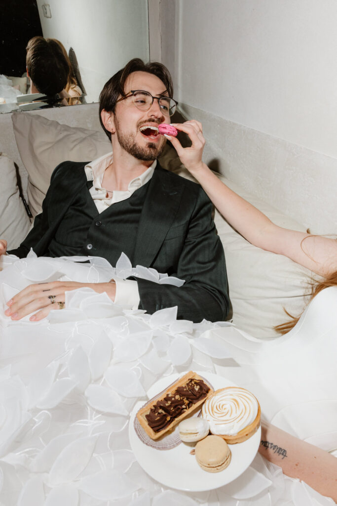 playful moment with wedding pastries during intimate wedding in Avignon